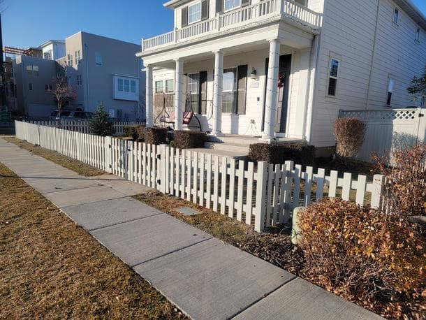 Classic White Picket Fence - Residential Installation